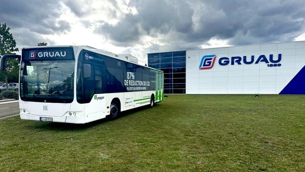 Bus touriste bleu, vehicules-garages